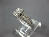 ESTATE .42CT DIAMOND 18KT WHITE GOLD ROUND & BAGUETTE CLASSIC CLUSTER FUN RING