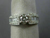 ESTATE .90CT ROUND & BAGUETTE DIAMOND 14KT WHITE GOLD FOUR PRONG ENGAGEMENT RING