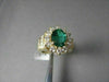 ESTATE 3.34CT DIAMOND & AAA COLOMBIAN EMERALD 14KT YELLOW GOLD FLOWER HALO RING
