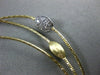 ESTATE .42CT DIAMOND 14KT TWO TONE GOLD HAMMERED BY THE YARD BANGLE BRACELET
