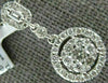 ESTATE .58CT DIAMOND 18KT WHITE GOLD 3D CLASSIC HALO ROUND & BAGUETTE PENDANT