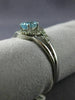 ESTATE .48CT DIAMOND & AAA OVAL CUT AQUAMARINE 14KT WHITE GOLD 3D LOVE KNOT RING
