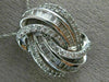 LARGE .75CT ROUND & BAGUETTE DIAMOND 14KT WHITE GOLD LOVE KNOT MULTI ROW PENDANT