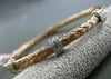 ESTATE .30CT DIAMOND 14KT WHITE & ROSE GOLD WOVEN 6mm FLEXIBLE BANGLE BRACELET