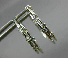 ESTATE .20CT DIAMOND 14KT WHITE GOLD 3D TWO ROW ETOILE OVAL HOOP EARRINGS