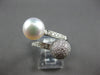 LARGE .80CT DIAMOND & AAA SOUTH SEA PEARL 18KT WHITE GOLD CRISS CROSS LOVE RING