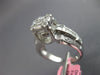1.37CT DIAMOND 18KT WHITE GOLD ROUND BAGUETTE & PRINCESS CLUSTER ENGAGEMENT RING