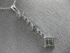 ESTATE LONG .56CT DIAMOND 18K WHITE GOLD CLASSIC JOURNEY INVISIBLE PENDANT 19808