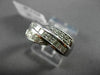 ESTATE WIDE .65CT ROUND & PRINCESS CUT DIAMOND 14KT WHITE GOLD X COCKTAIL RING