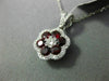 ESTATE .74CT DIAMOND & AAA RUBY 18KT WHITE GOLD CLASSIC FLOWER FLOATING PENDANT