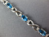 LONG 5.05CT DIAMOND & AAA BLUE TOPAZ 14KT WHITE GOLD OVAL X LOVE TENNIS BRACELET
