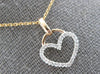 ESTATE .10CT DIAMOND 14KT ROSE GOLD 3D CLASSIC OPEN HEART LOVE FLOATING PENDANT