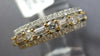ESTATE WIDE .94CT DIAMOND 14KT 2 TONE GOLD 3D ROUND & BAGUETTE ANNIVERSARY RING