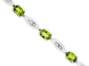 5.4CT DIAMOND & AAA PERIDOT 14KT WHITE GOLD 3D OVAL & BAGUETTE TENNIS BRACELET