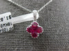 SMALL .78CT DIAMOND & AAA RUBY 18KT WHITE GOLD INVISIBLE 4 LEAF CLOVER PENDANT