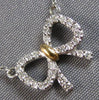ESTATE SMALL .07CT DIAMOND 14KT WHITE & YELLOW GOLD 3D CLASSIC BOW LOVE NECKLACE
