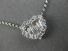 ESTATE .84CT ROUND & BAGUETTE DIAMOND 18KT WHITE GOLD 3D HEART LOVE NECKLACE