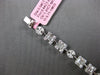 4.22CT DIAMOND 18KT WHITE GOLD ROUND BAGUETTE & MARQUISE SQUARE TENNIS BRACELET