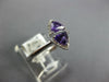 .70CT DIAMOND & AAA AMETHYST 14KT WHITE GOLD TRILLION & ROUND CRISS CROSS RING