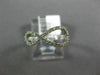 ESTATE .23CT ROUND CUT DIAMOND 14KT WHITE GOLD 3D CLASSIC INFINITY LOVE RING