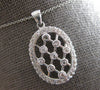 ESTATE .60CT DIAMOND 14KT WHITE GOLD 3D CRISS CROSS ETOILE OVAL FLOATING PENDANT