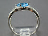 1.38CT DIAMOND & AAA BLUE TOPAZ 14KT WHITE GOLD OVAL & ROUND MULTI ROW FUN RING