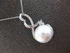 LARGE .36CT DIAMOND & SOUTH SEA PEARL 18KT WHITE GOLD LOVE KNOT FLOATING PENDANT