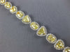 EXTRA LARGE 22.15CT WHITE & FANCY YELLOW DIAMOND 18KT WHITE GOLD TENNIS BRACELET