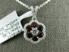 ESTATE .74CT DIAMOND & AAA RUBY 18KT WHITE GOLD CLASSIC FLOWER FLOATING PENDANT