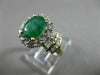 ESTATE 1.82CT ROUND & BAGUETTE DIAMOND & AAA EMERALD 14K TWO TONE GOLD HALO RING