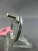 ESTATE WIDE 18KT WHITE GOLD FUN RING. 3D CLUSTER CRISS CROSS ETOILE DESIGN