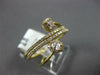 .50CT DIAMOND 18KT YELLOW GOLD ROUND BAGUETTE & OVAL MULTI ROW CRISS CROSS RING