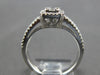 ESTATE .79CT DIAMOND 18KT WHITE GOLD ROUND & BAGUETTE CLUSTER SQUARE LOVE RING