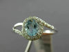 ESTATE .48CT DIAMOND & AAA OVAL CUT AQUAMARINE 14KT WHITE GOLD 3D LOVE KNOT RING