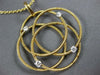 ESTATE LARGE .22CT DIAMOND 18KT 2 TONE GOLD CIRCULAR FLOWER ETOILE MESH PENDANT