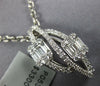 .73CT DIAMOND 18KT WHITE GOLD ROUND & BAGUETTE DOUBLE LEAF INFINITY LOVE PENDANT