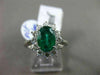 ANTIQUE LARGE 2.14CT DIAMOND & AAA COLOMBIAN EMERALD PLATINUM CLUSTER OVAL RING
