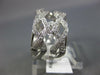 ESTATE WIDE .54CT DIAMOND 18KT WHITE GOLD DOUBLE ROW INFINITY ANNIVERSARY RING