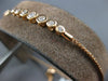 .35CT DIAMOND 18KT ROSE GOLD BEZEL 7 STONE GRADUATING ADJUSTABLE TENNIS BRACELET