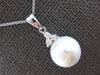 .08CT DIAMOND & SOUTH SEA PEARL 14KT WHITE GOLD FLOWER 3 STONE FLOATING PENDANT