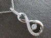 ESTATE .65CT DIAMOND 14KT WHITE GOLD SOLITAIRE DANCING DIAMOND FLOATING PENDANT