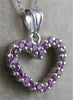 ESTATE PINK SAPPHIRE 14KT WHITE GOLD OPEN HEART PENDANT + CHAIN