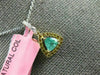 .69CT WHITE & FANCY YELLOW DIAMONDS & EMERALD 18K YELLOW GOLD TRILLION PENDANT