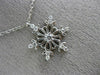 ESTATE .16CT DIAMOND 14KT WHITE GOLD 3D SNOWFLAKE FLOATING LOVE PENDANT