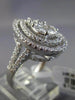 LARGE 18KT WHITE GOLD ENGAGEMENT RING. 3D CLUSTER PEAR SHAPE DOUBLE HALO DESIGN