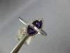 .70CT DIAMOND & AAA AMETHYST 14KT WHITE GOLD TRILLION & ROUND CRISS CROSS RING