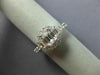 ESTATE 1.29CT DIAMOND 14K WHITE GOLD BAGUETTE & ROUND HALO ENGAGEMENT RING 26686