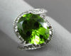 ESTATE WIDE 4.15CT DIAMOND & AAA PERIDOT 14KT WHITE GOLD OVAL INFINITY FUN RING