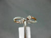 ESTATE .34CT DIAMOND 14KT ROSE GOLD 3D CLASSIC 2 STONE INFINITY CRISS CROSS RING