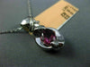 ESTATE .85CT DIAMOND & PINK SAPPHIRE 14KT WHITE GOLD SEMI BEZEL X LOVE PENDANT